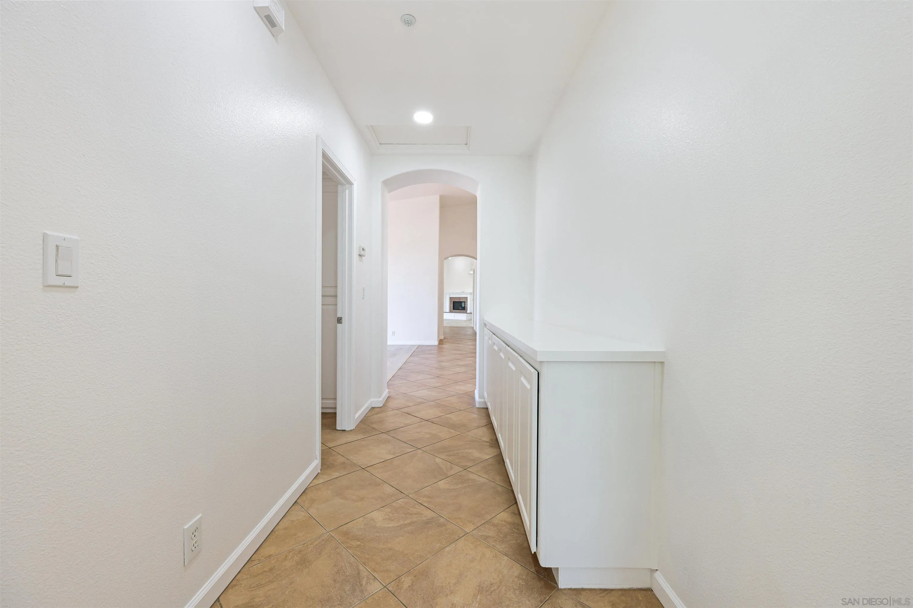26335 Engelmann Road Valley Center, CA 92082 - Photo 24 of 42 a view of a hallway with white walls