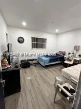 220 North 66th Avenue Hollywood, FL 33024 - Photo 2 of 8 a living room with lots of furniture and kitchen view