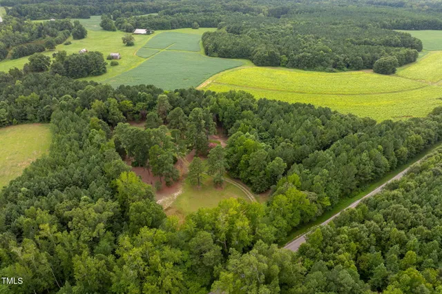 a view of a lake with a yard