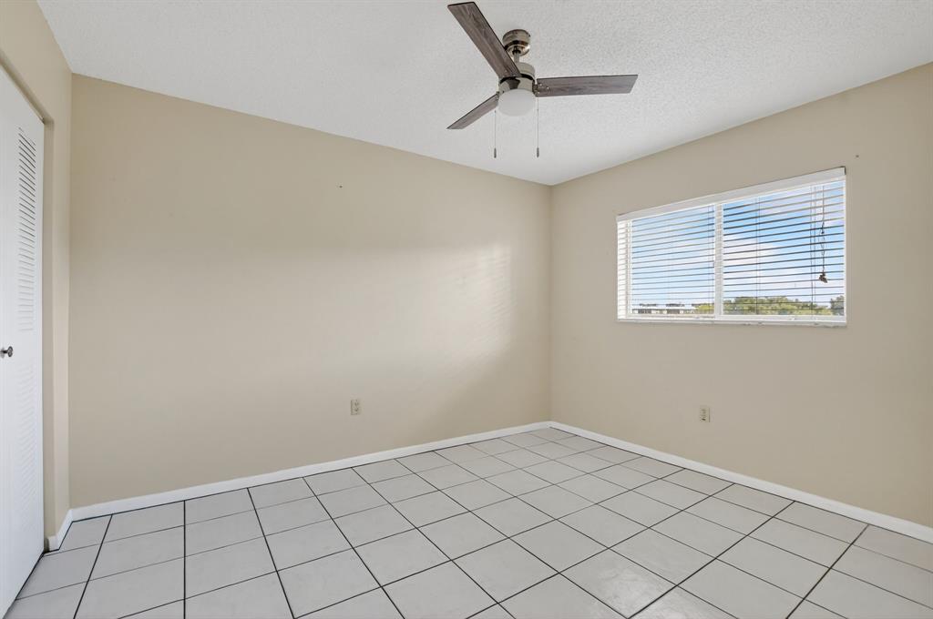 2236 North Cypress Bend Drive, Unit 508 Pompano Beach, FL 33069 - Photo 19 of 69 a view of an empty room