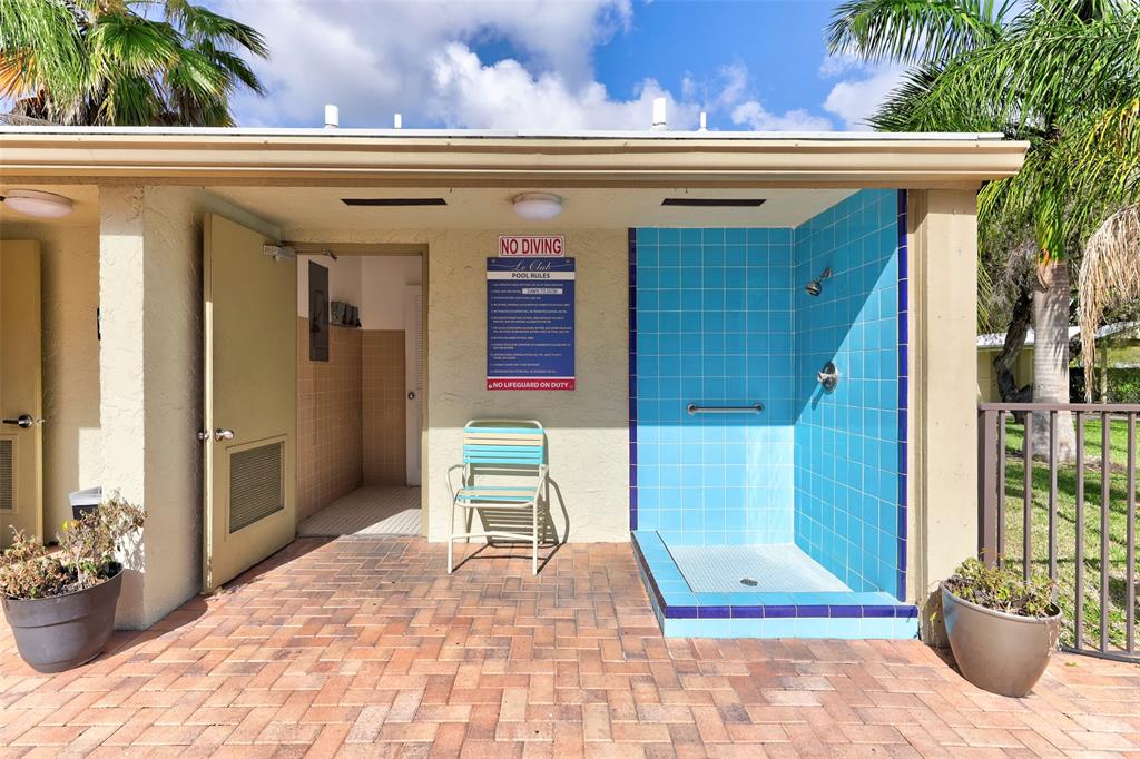 2236 North Cypress Bend Drive, Unit 508 Pompano Beach, FL 33069 - Photo 31 of 69 a view of outdoor space deck and patio