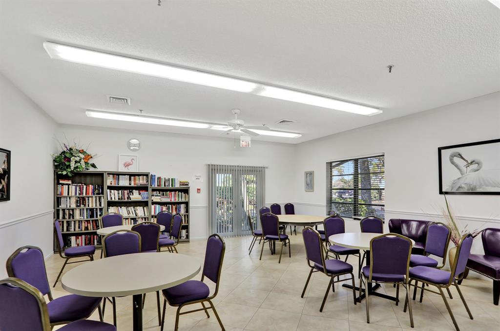 2236 North Cypress Bend Drive, Unit 508 Pompano Beach, FL 33069 - Photo 43 of 69 a view of a livingroom with furniture and window