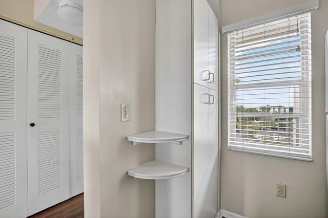 a view of an empty room and window