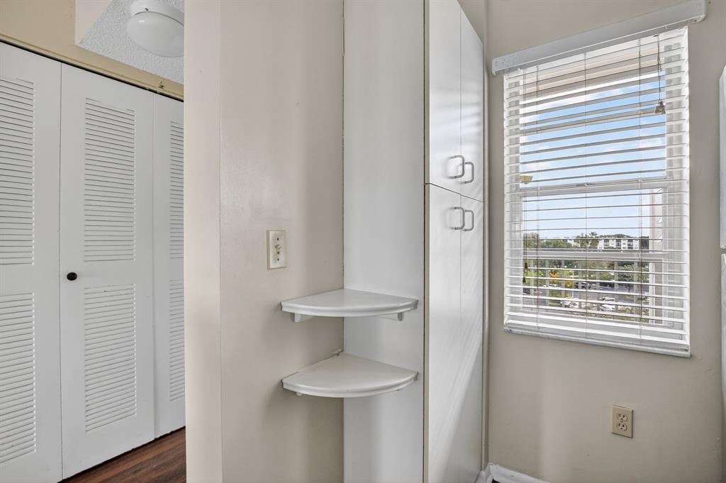 2236 North Cypress Bend Drive, Unit 508 Pompano Beach, FL 33069 - Photo 8 of 69 a bathroom with a toilet and a sink