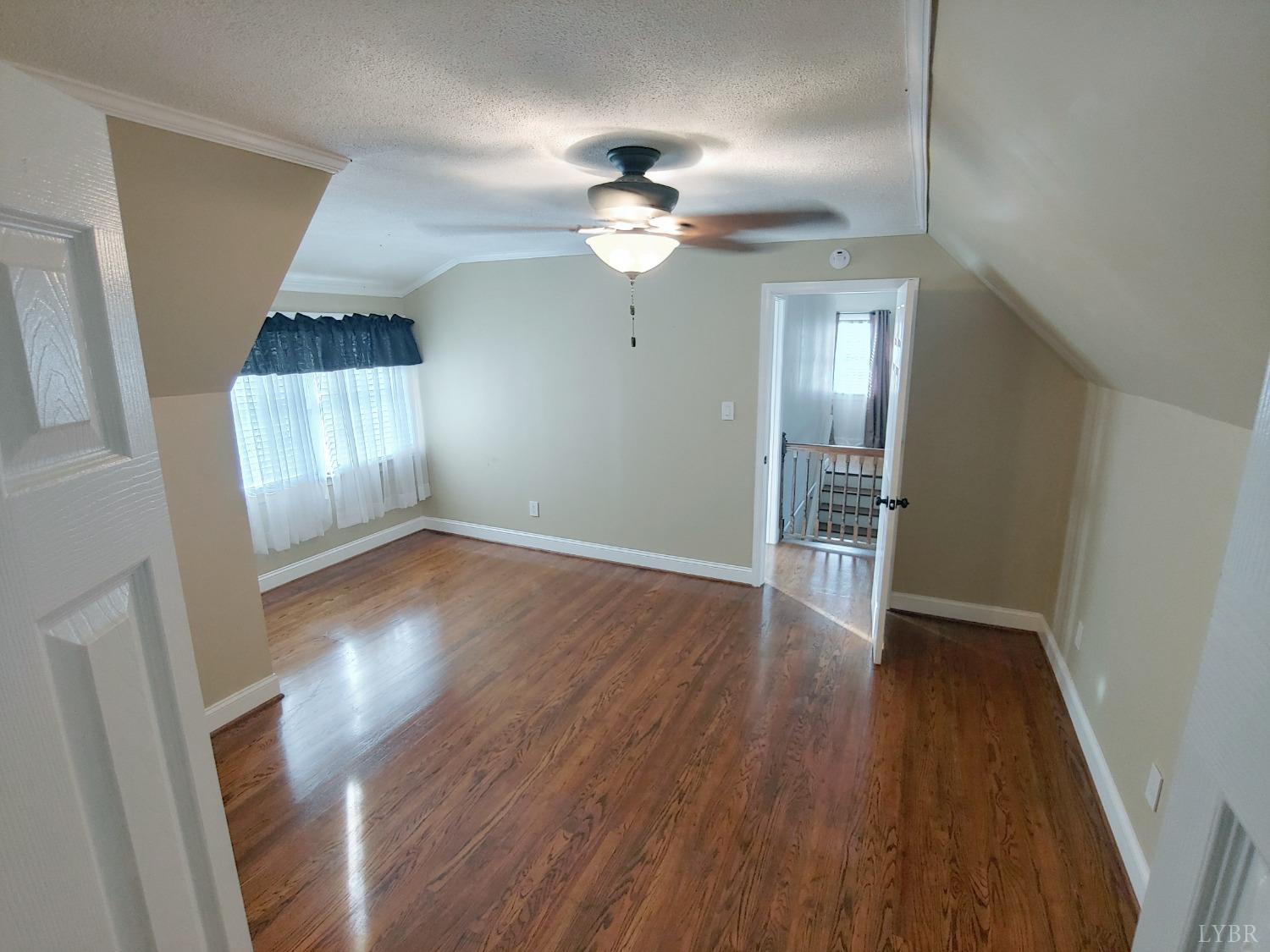 3941 Shula Drive Hurt, VA 24563 - Photo 58 of 67 wooden floor in an empty room with a window