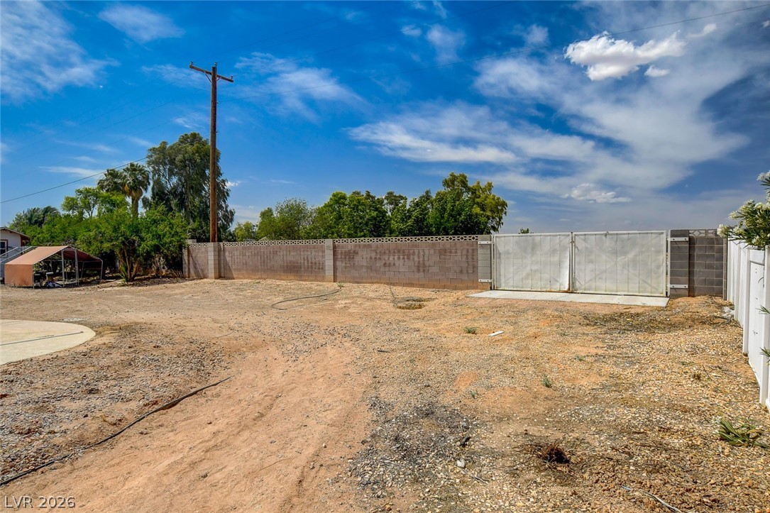 4362 Thistle Street Logandale, NV 89021 - Photo 82 of 99 A spacious, open lot with secure perimeter fencing awaits your vision.