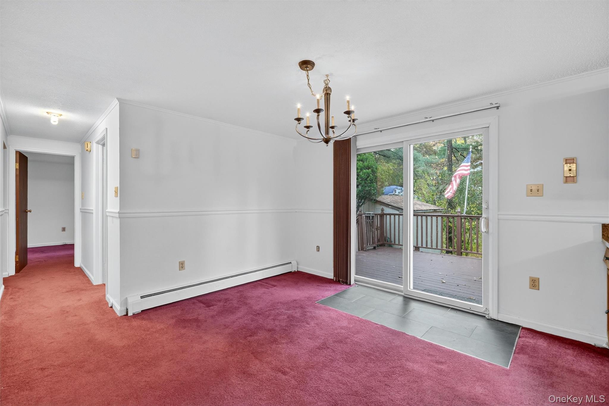 114 Laurel Hill Road Croton-on-Hudson, NY 10520 - Photo 12 of 34 an empty room with windows and outdoor view