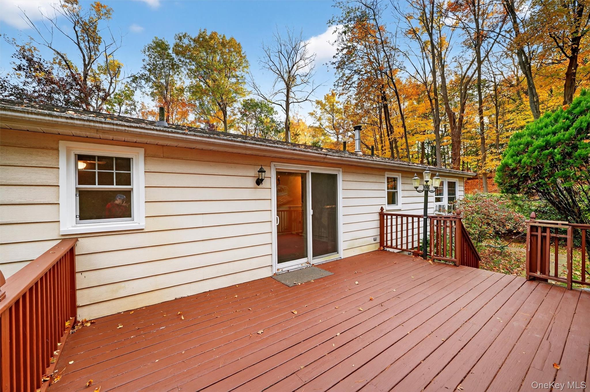 114 Laurel Hill Road Croton-on-Hudson, NY 10520 - Photo 29 of 34 a view of backyard with a deck and wooden floor