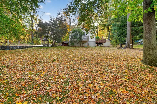 a house with trees in front of it