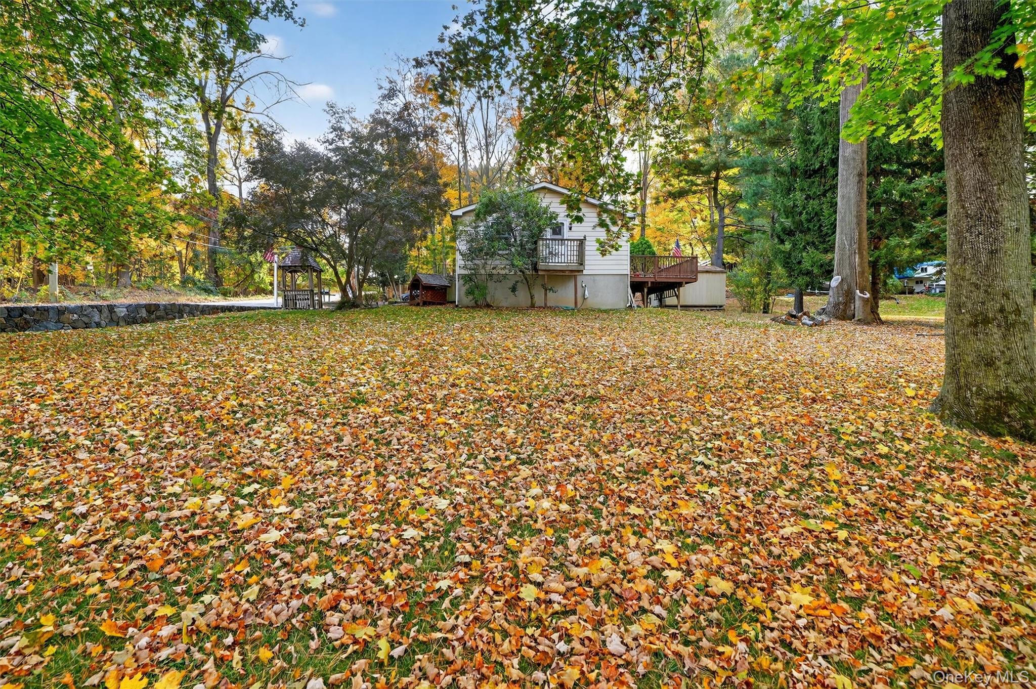 114 Laurel Hill Road Croton-on-Hudson, NY 10520 - Photo 30 of 34 a front view of a house with a yard