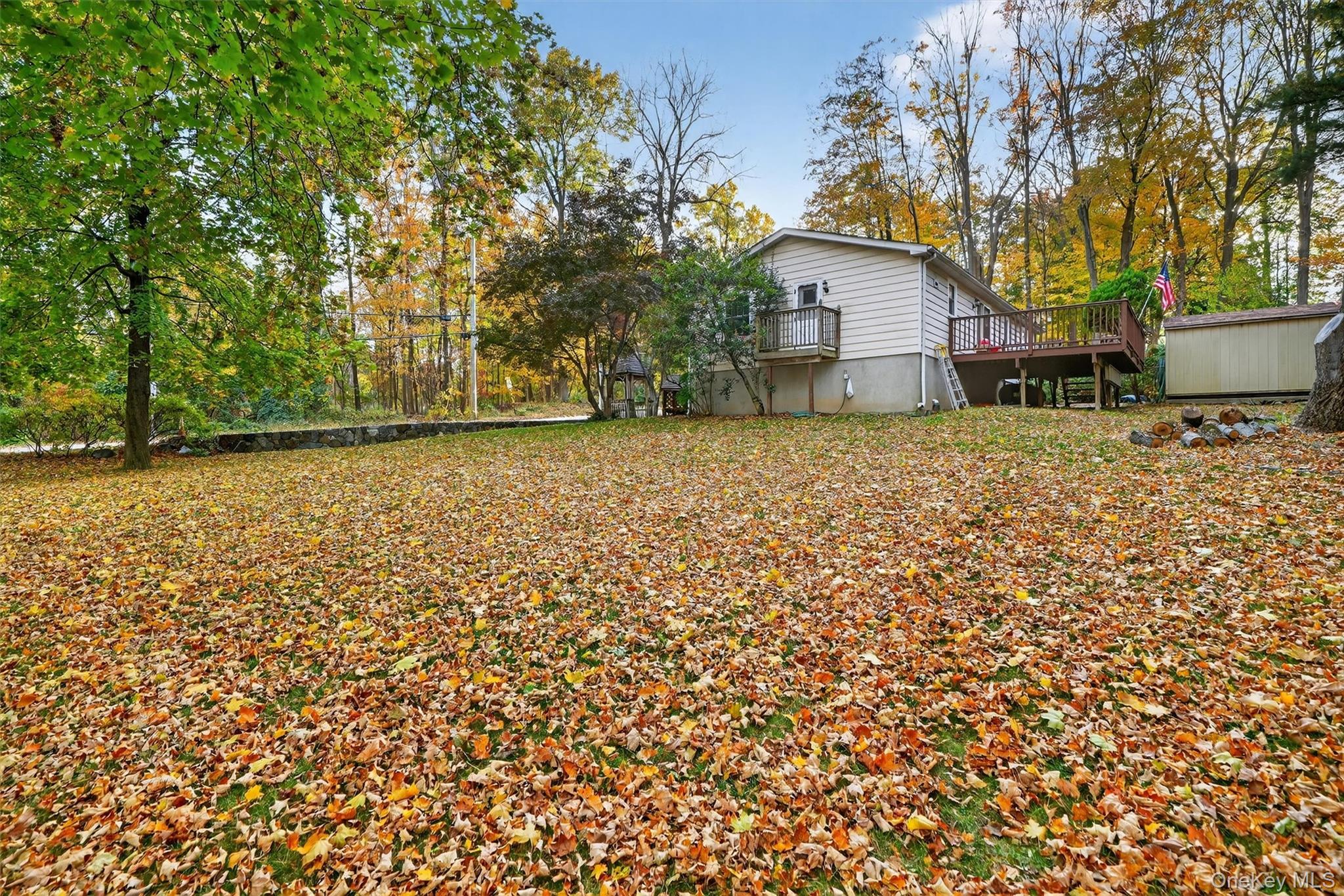 114 Laurel Hill Road Croton-on-Hudson, NY 10520 - Photo 31 of 34 a house with trees in front of it