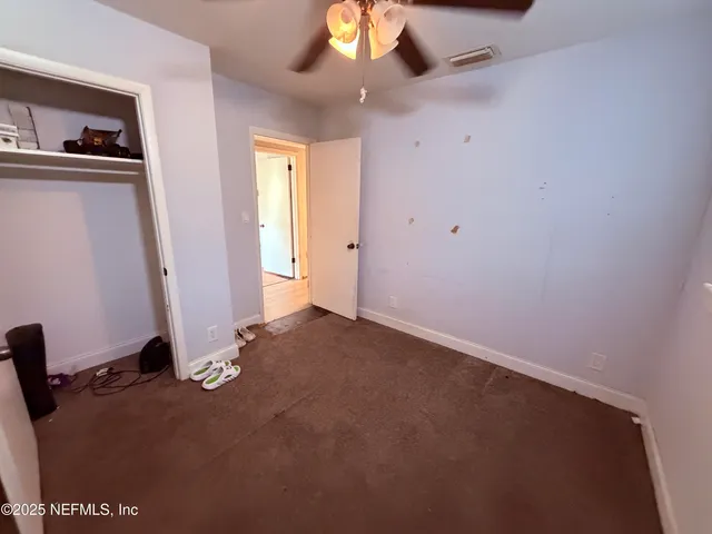 a view of a livingroom with a staircase