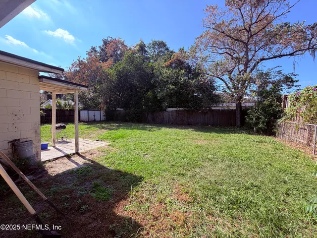a view of a backyard with a garden