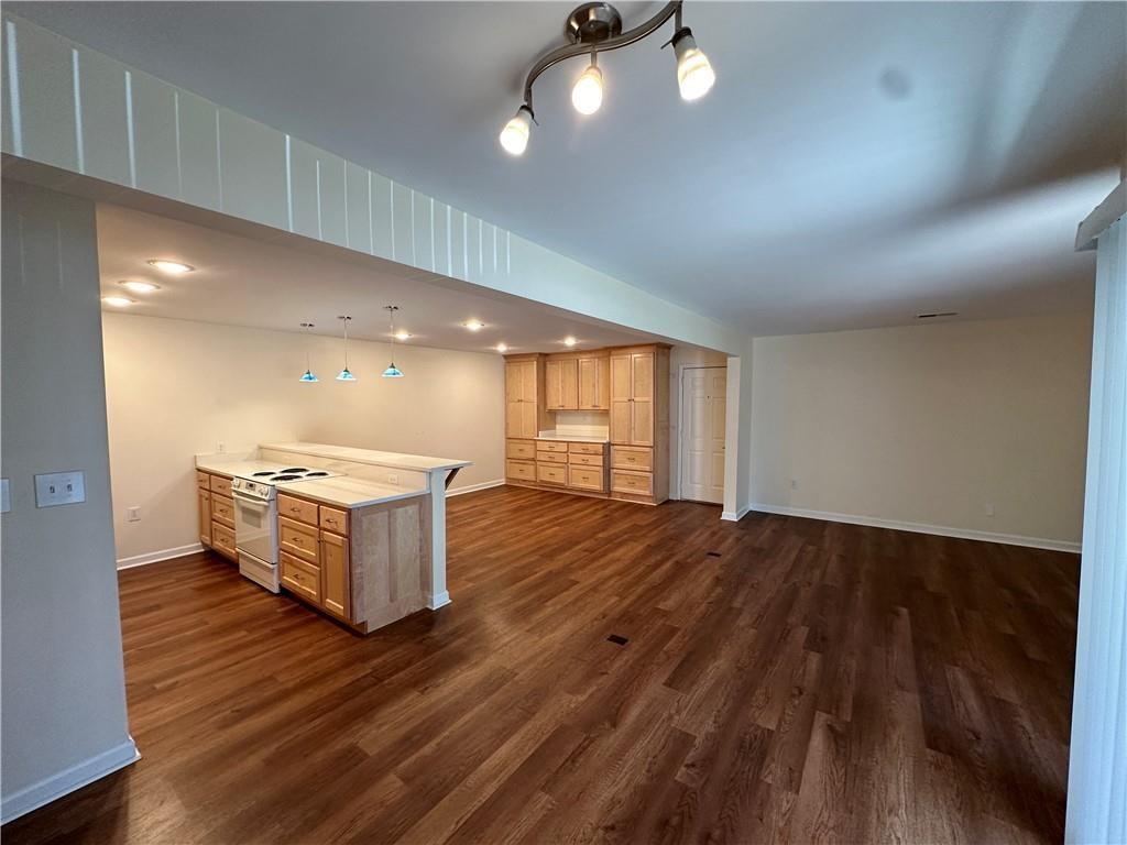 605 Candler Street, Unit C9 Gainesville, GA 30501 - Photo 2 of 18 a kitchen with a sink and cabinets