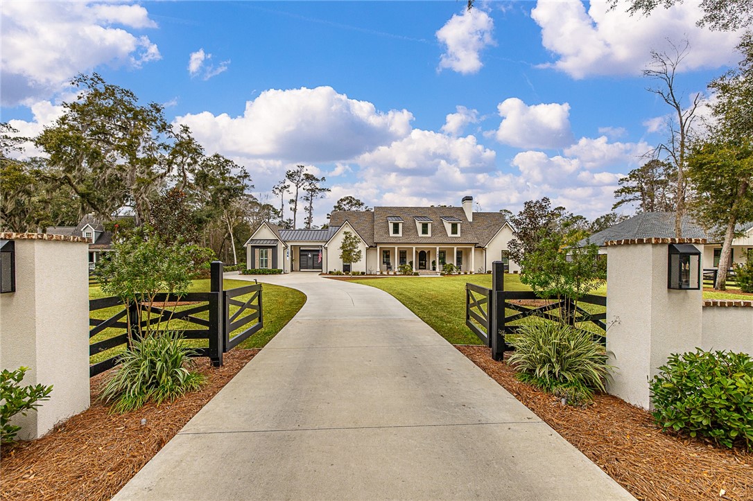 145 Butler Lake Drive St. Simons Island, GA 31522 - Photo 1 of 100 Entry gate