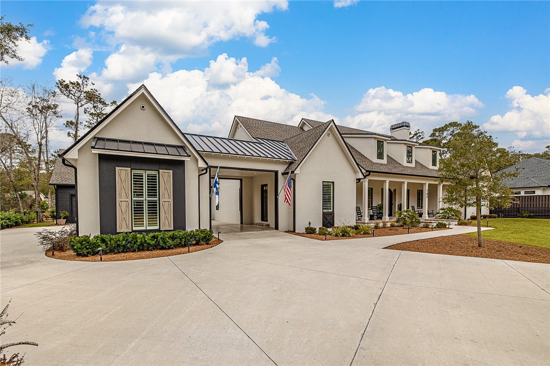 145 Butler Lake Drive St. Simons Island, GA 31522 - Photo 3 of 100 Portico leading to guest quarters