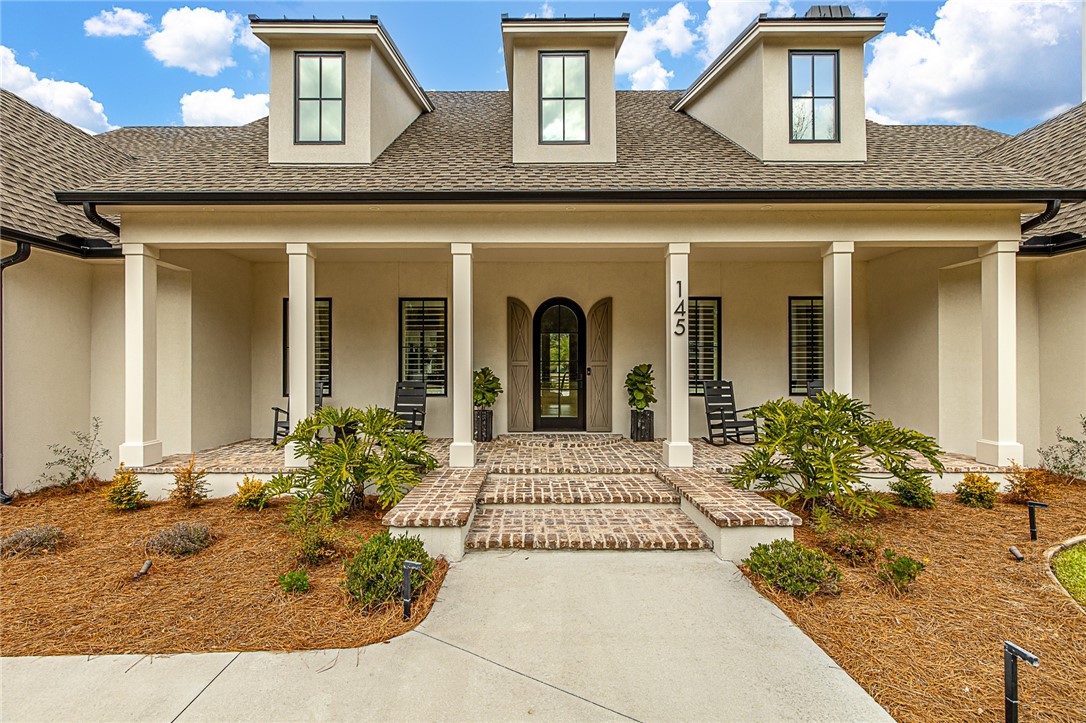 145 Butler Lake Drive St. Simons Island, GA 31522 - Photo 5 of 100 Covered front porch