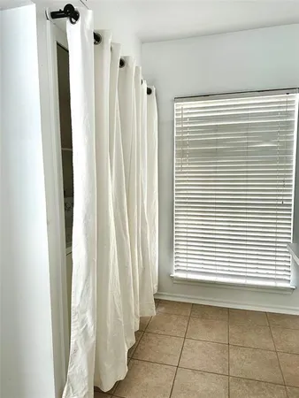 a view of a room with a window