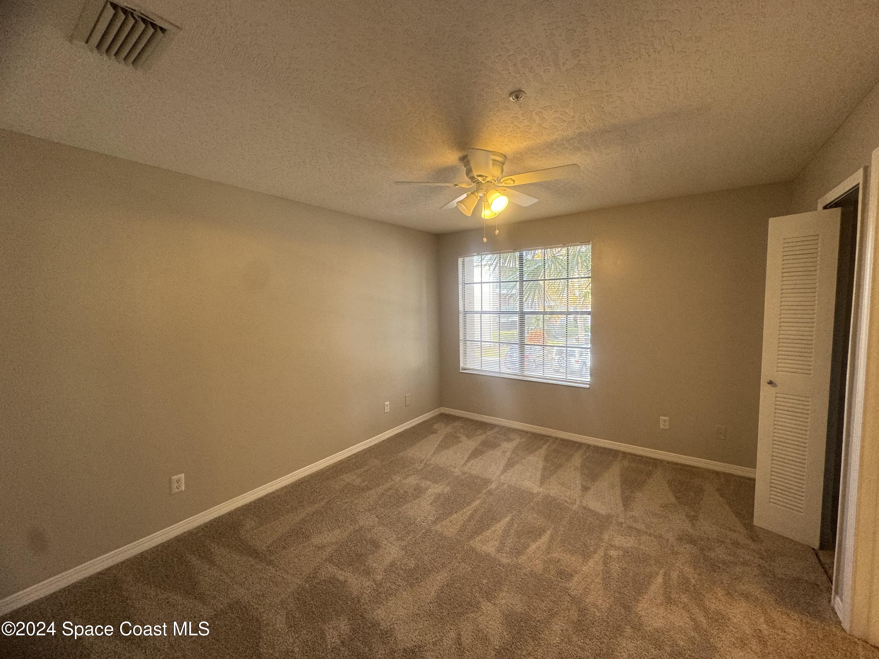 7667 North Wickham Road, Unit 515 Melbourne, FL 32940 - Photo 5 of 19 IMG_3327