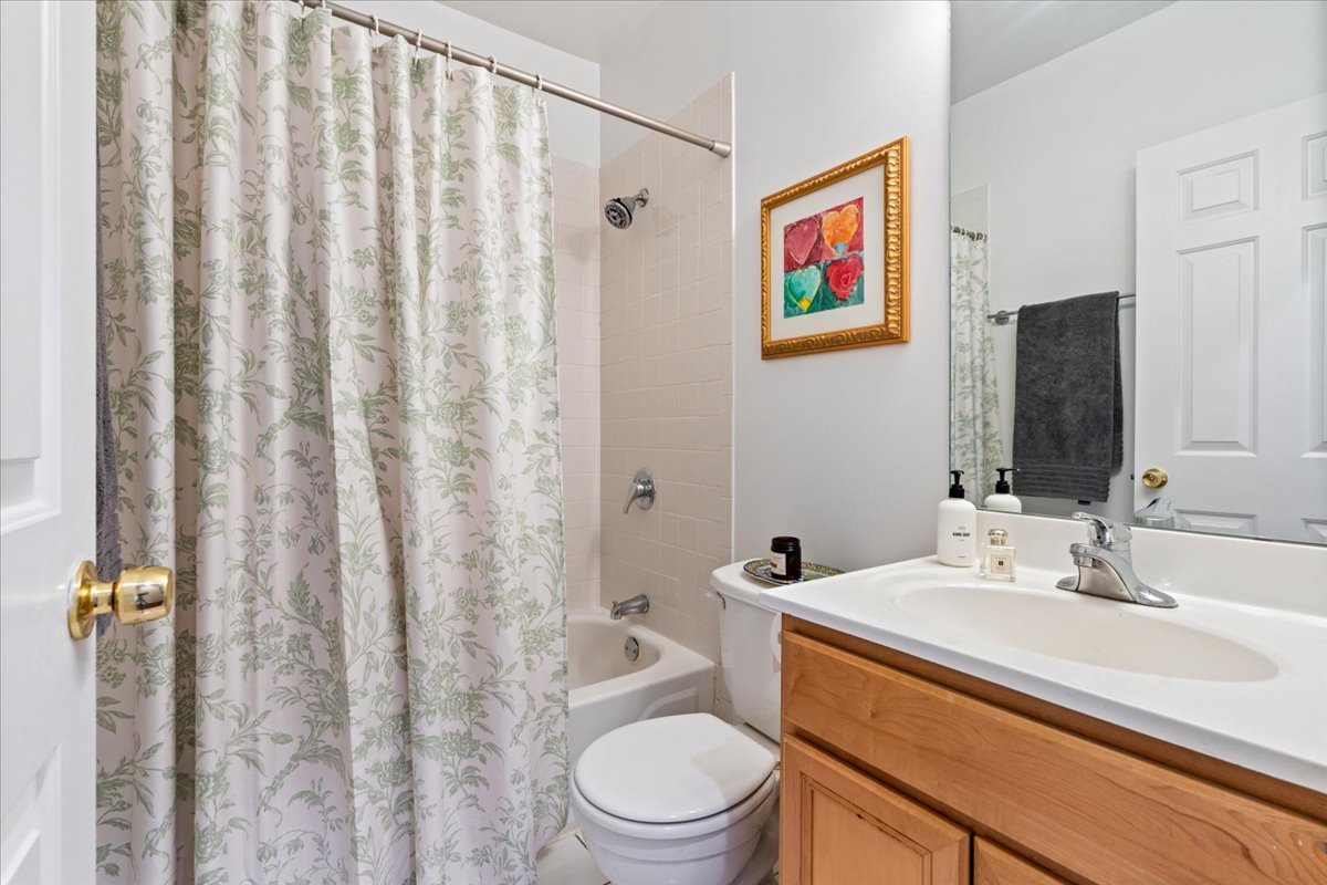 2121 West Division Street, Unit 1 Chicago, IL 60622 - Photo 16 of 18 a bathroom with a toilet a sink and a mirror