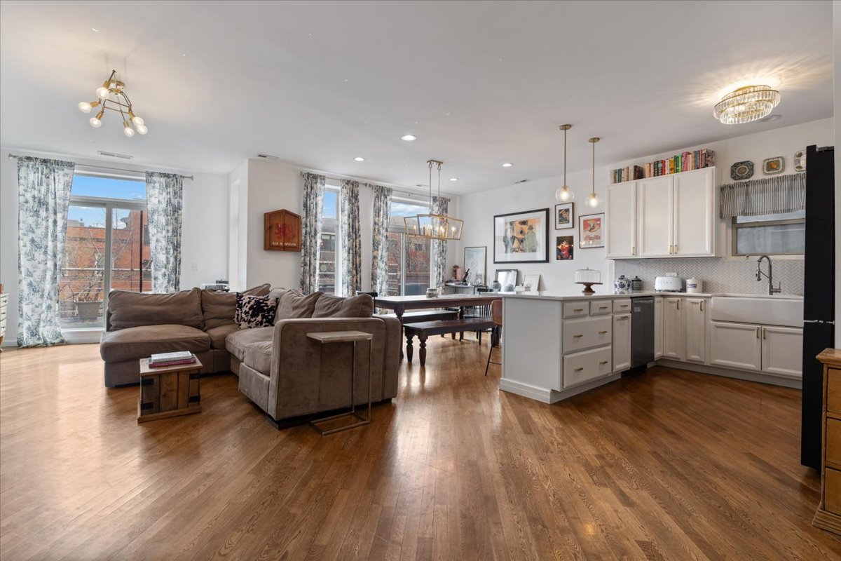 2121 West Division Street, Unit 1 Chicago, IL 60622 - Photo 2 of 18 a living room with furniture and kitchen view