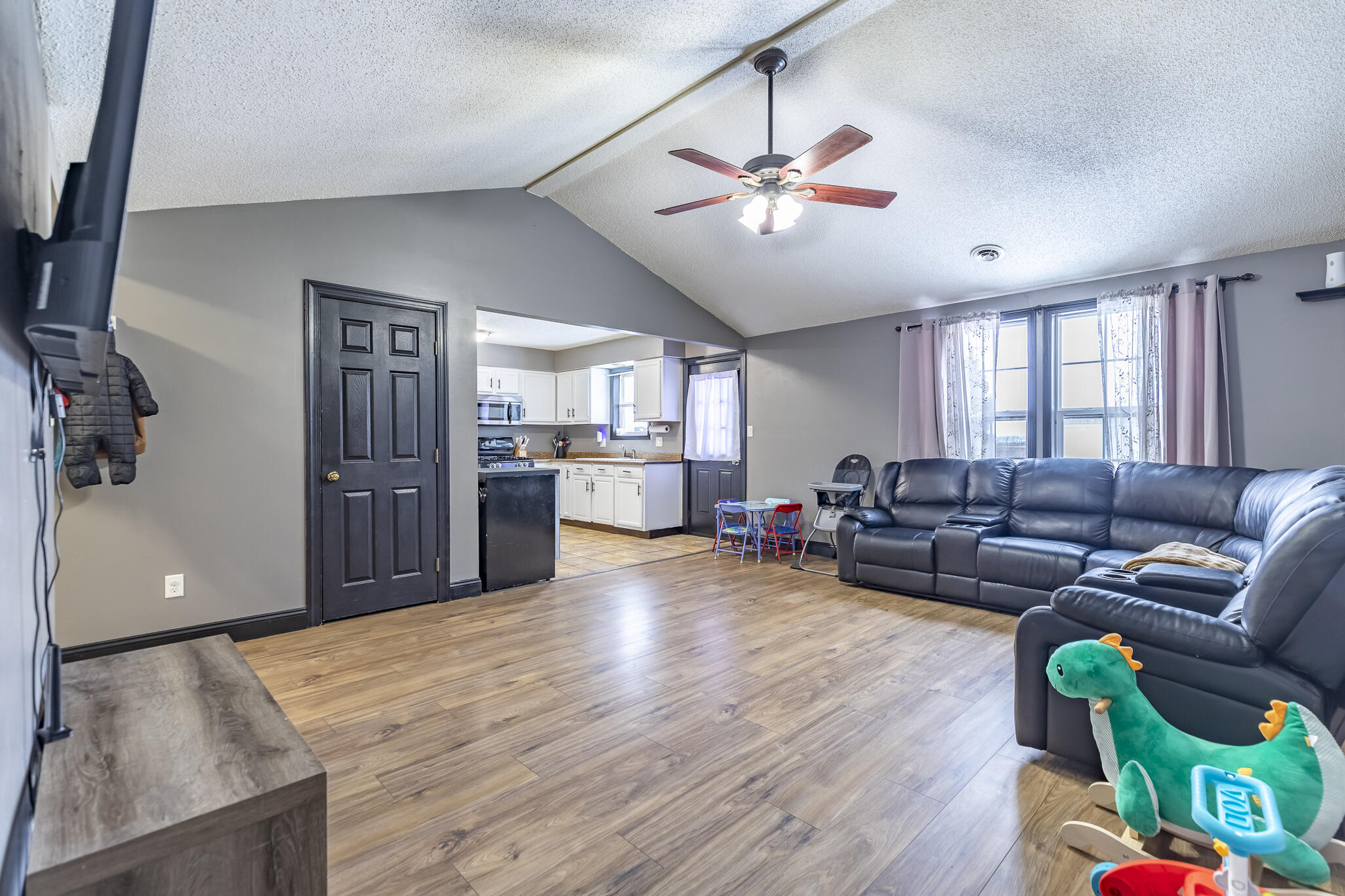 202 South Jefferson Street Hamlet, IN 46532 - Photo 12 of 20 a living room with furniture and a wooden floor