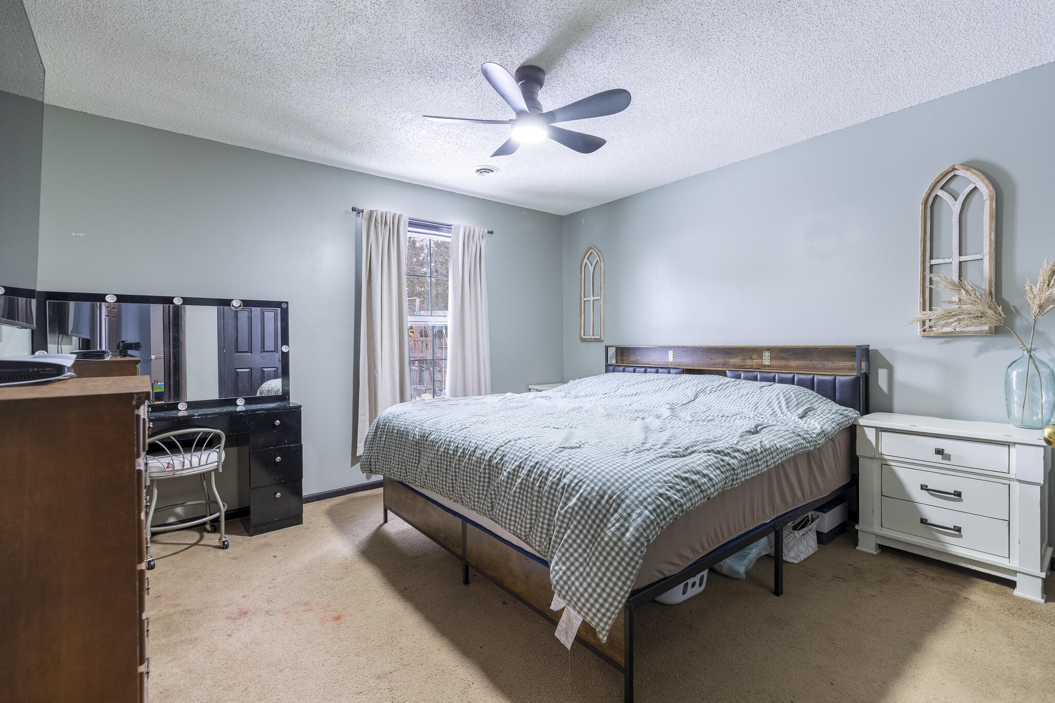 202 South Jefferson Street Hamlet, IN 46532 - Photo 17 of 20 a spacious bedroom with a bed and dresser