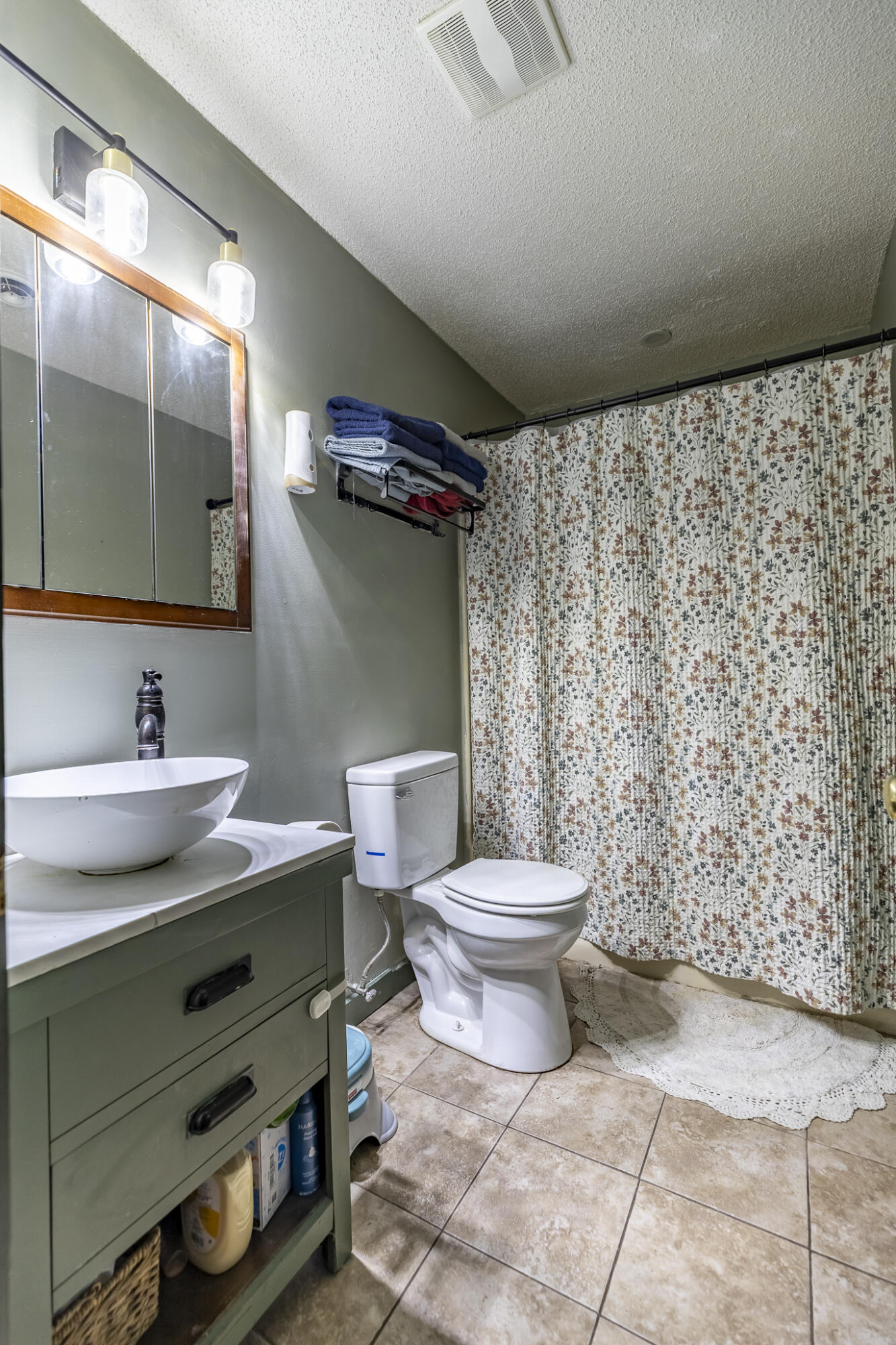 202 South Jefferson Street Hamlet, IN 46532 - Photo 19 of 20 a bathroom with a toilet sink and mirror