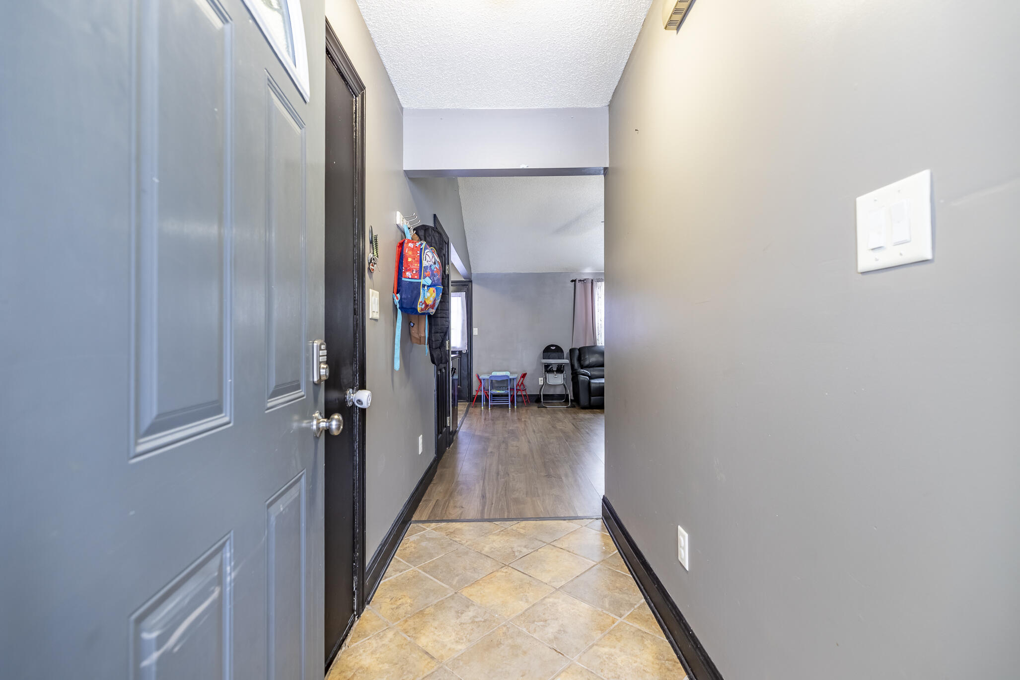 202 South Jefferson Street Hamlet, IN 46532 - Photo 9 of 20 a view of a hallway with a hardwood floor