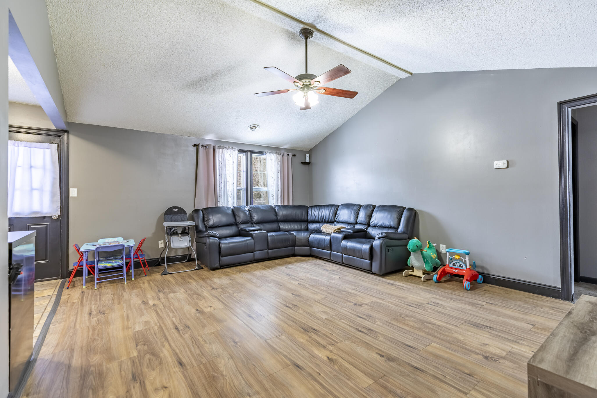 202 South Jefferson Street Hamlet, IN 46532 - Photo 10 of 20 a living room with furniture and wooden floor