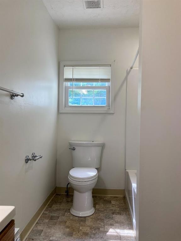 4974 Williamsport Road Elizabeth, PA 15037 - Photo 12 of 34 a bathroom with a toilet and a sink