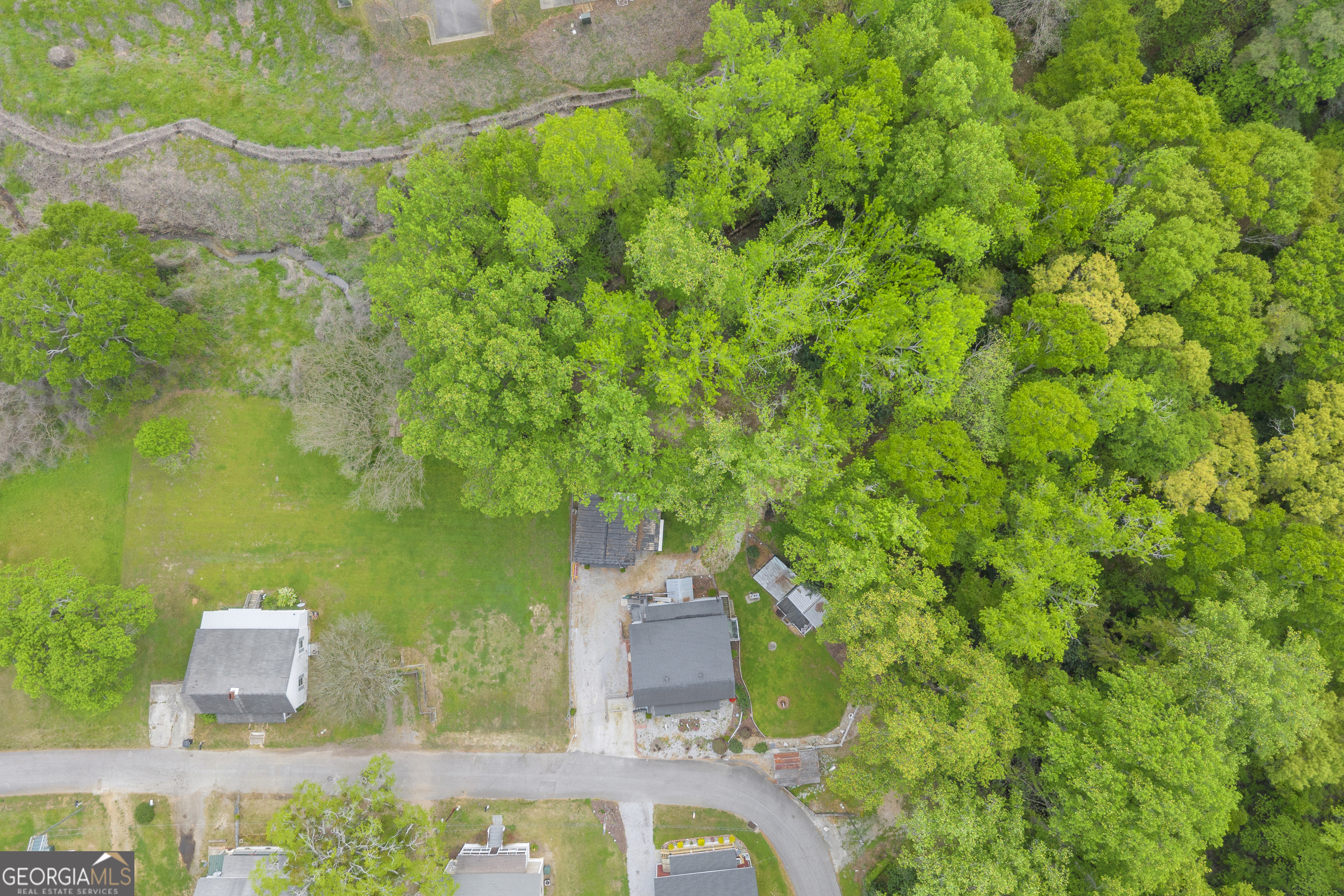 180 Liberty Circle Hartwell, GA 30643 - Photo 15 of 58 an aerial view of residential house with outdoor space and trees all around