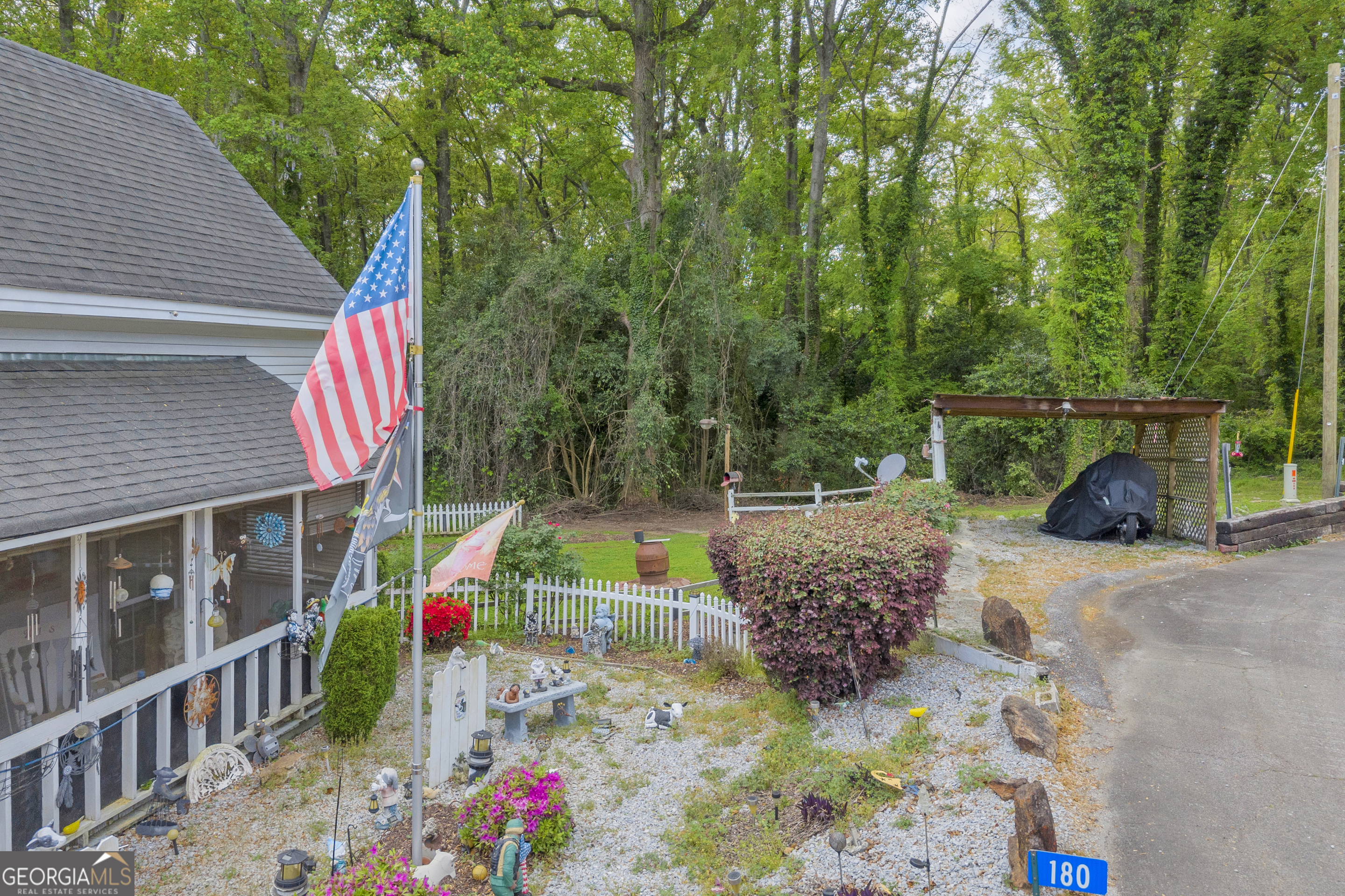 180 Liberty Circle Hartwell, GA 30643 - Photo 18 of 58 a view of a house with a backyard and tree s