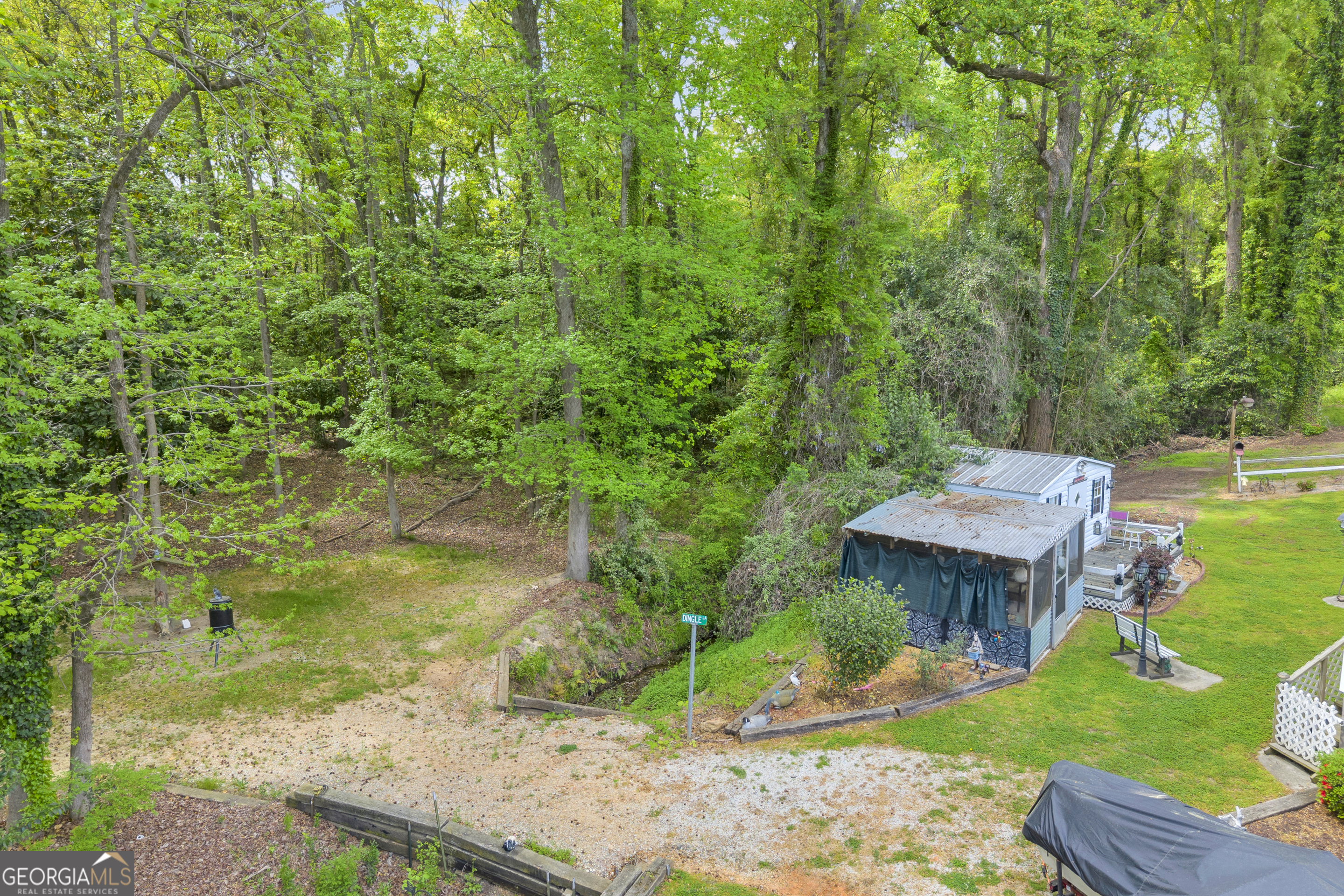 180 Liberty Circle Hartwell, GA 30643 - Photo 24 of 58 a view of a backyard with wooden fence