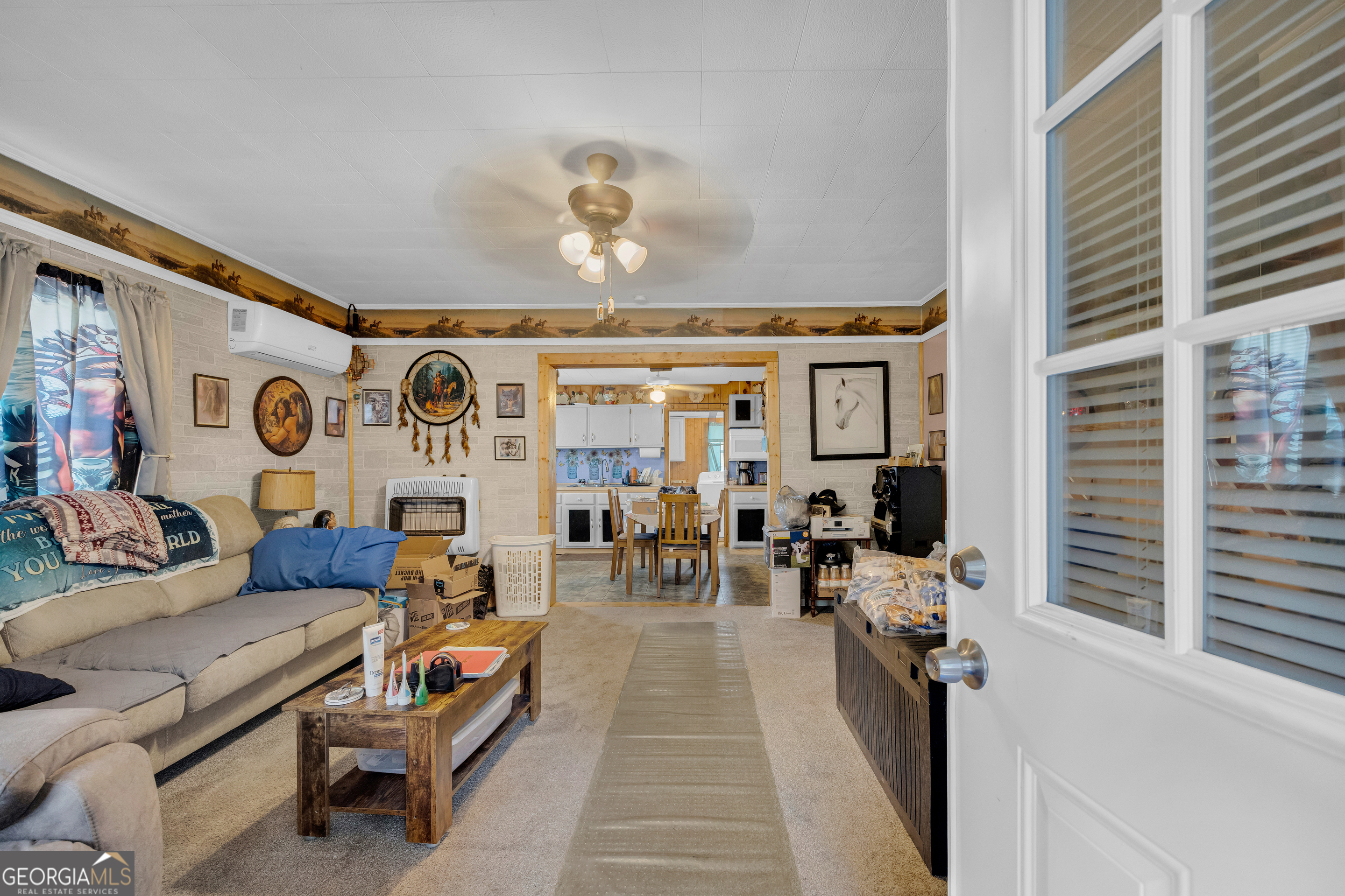 180 Liberty Circle Hartwell, GA 30643 - Photo 35 of 58 a living room with furniture and wooden floor