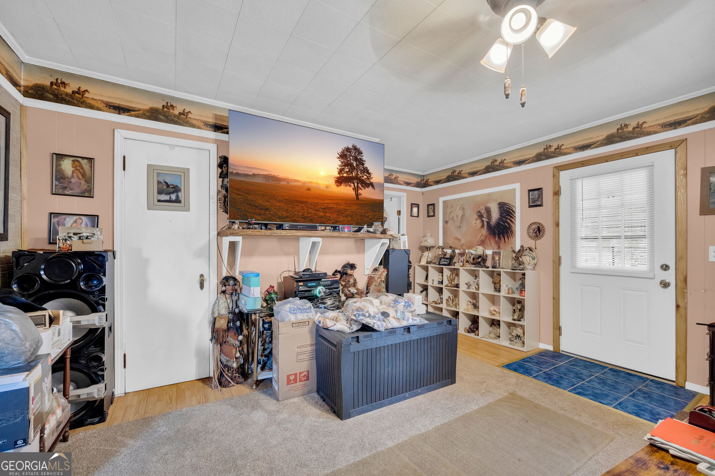 180 Liberty Circle Hartwell, GA 30643 - Photo 41 of 58 a living room with furniture and a flat screen tv