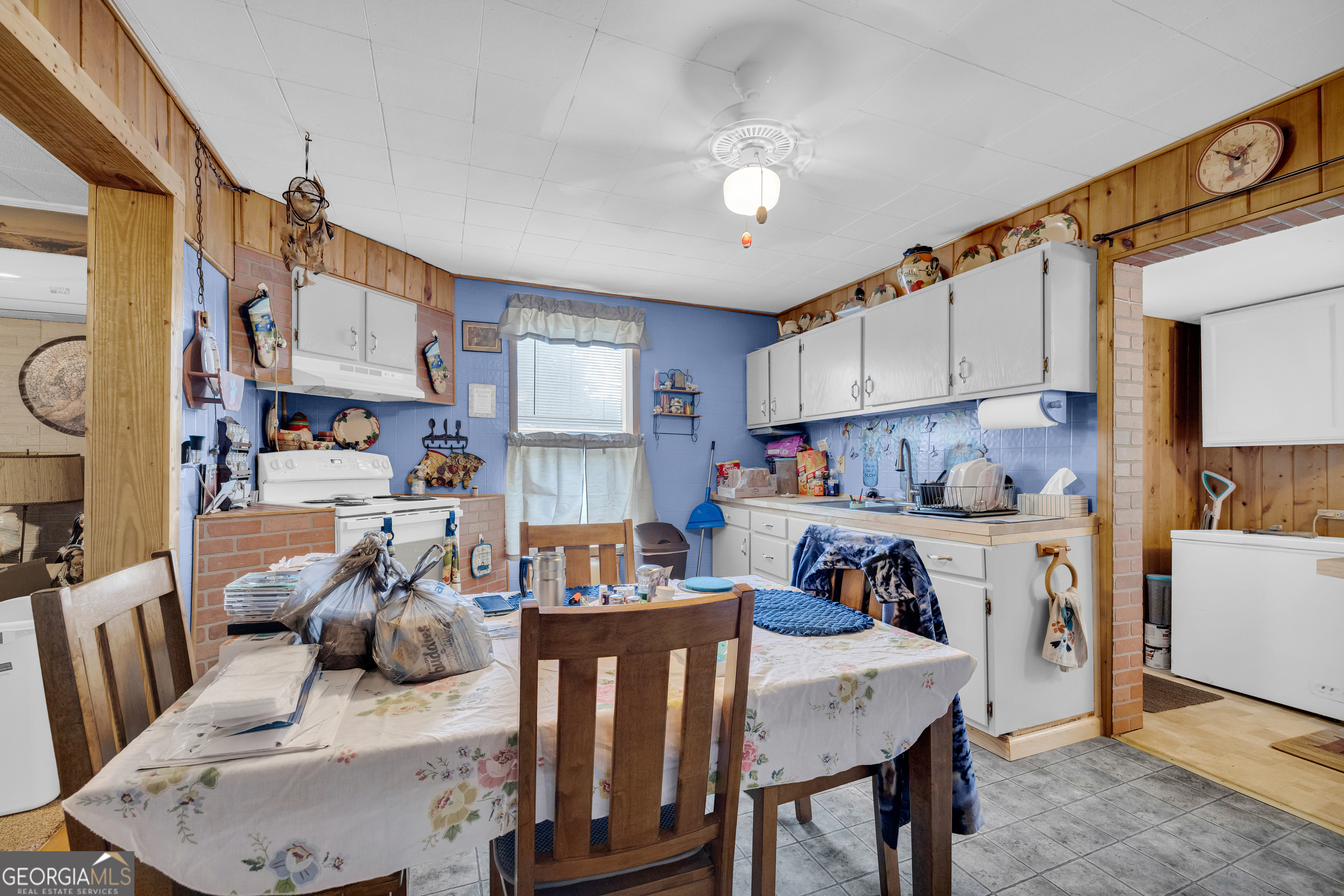 180 Liberty Circle Hartwell, GA 30643 - Photo 48 of 58 a view of kitchen and dining area with furniture