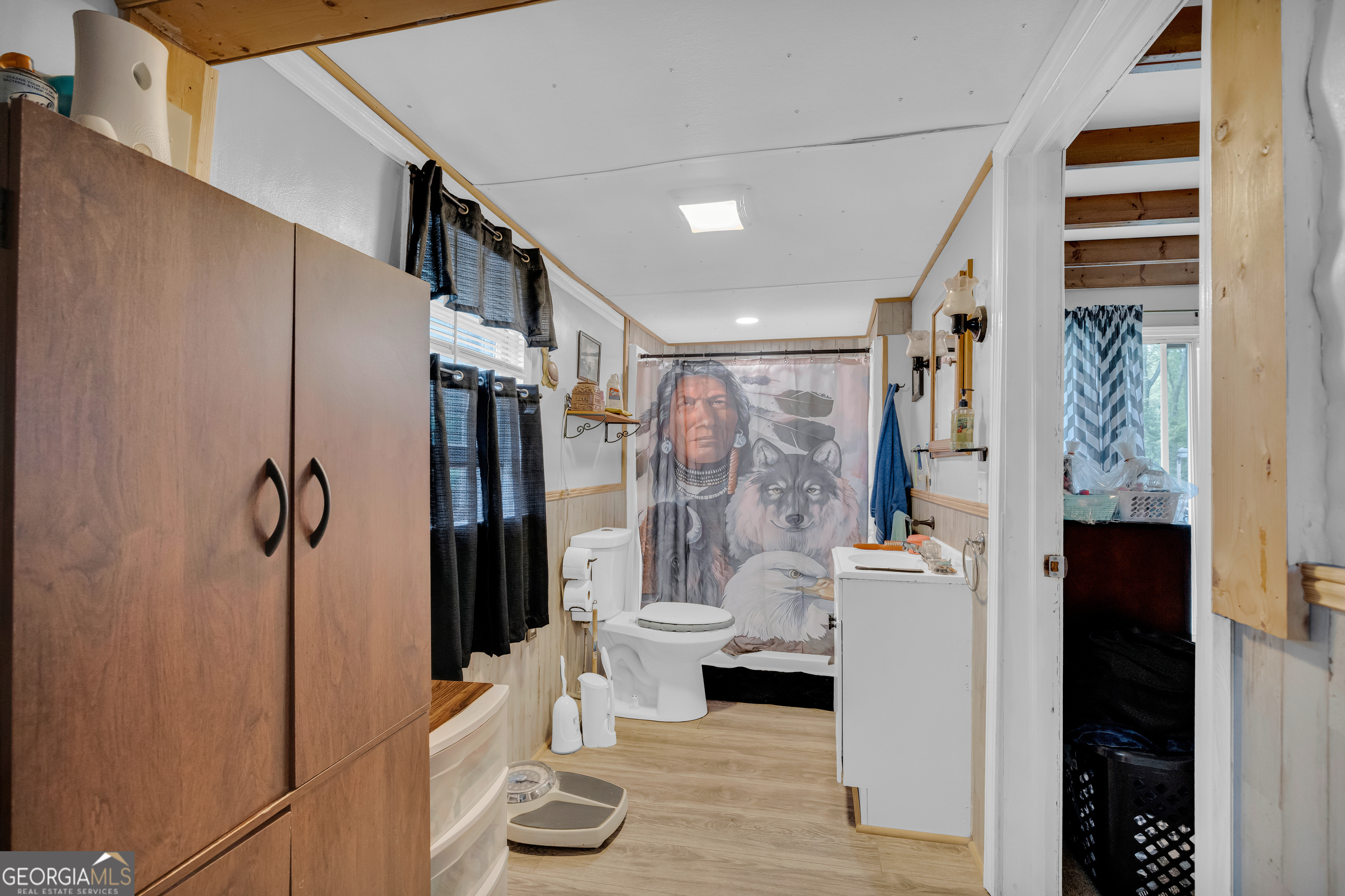 180 Liberty Circle Hartwell, GA 30643 - Photo 52 of 58 a bathroom with a shower and a sink