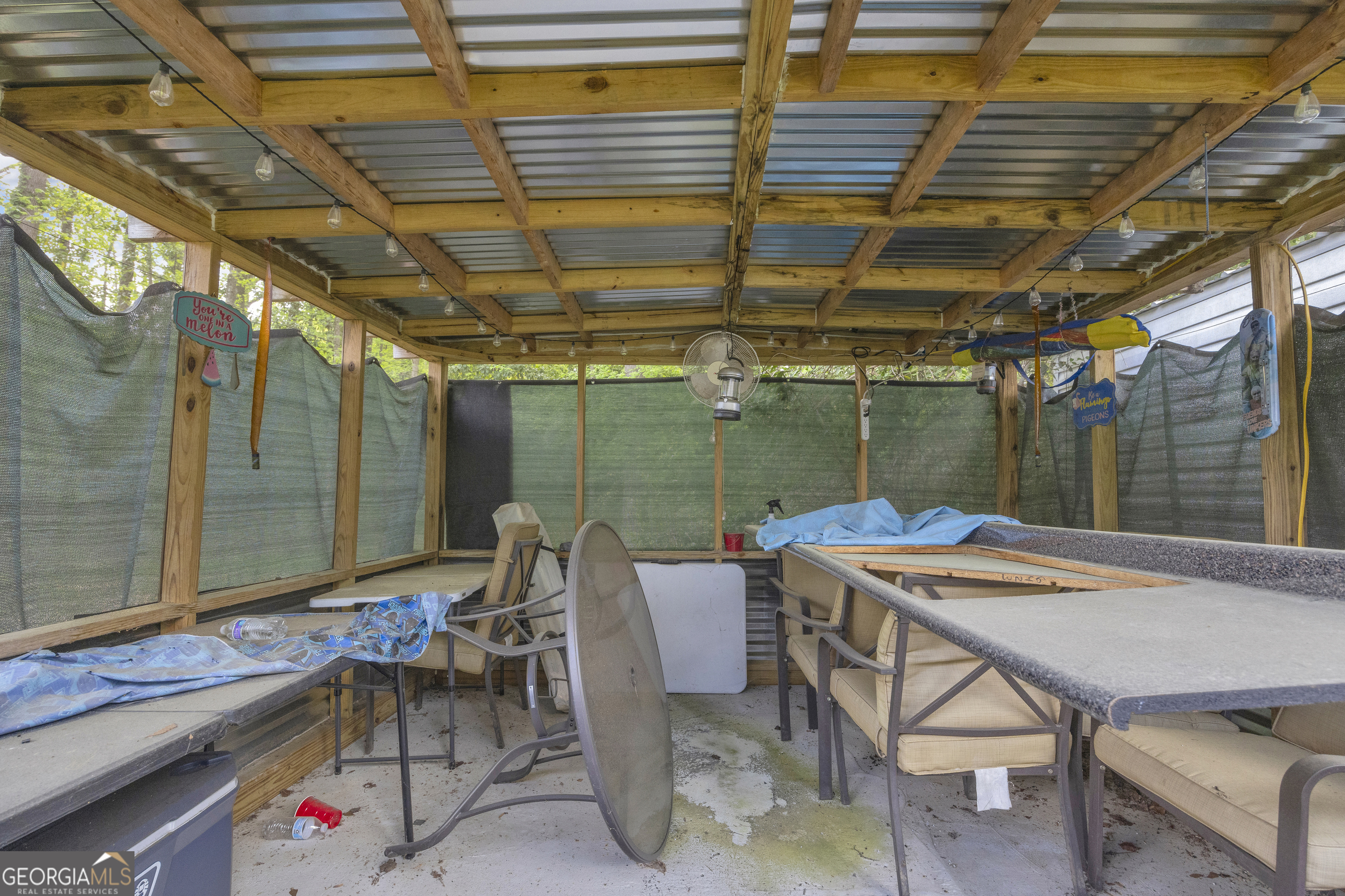 180 Liberty Circle Hartwell, GA 30643 - Photo 57 of 58 a patio with a table and chairs