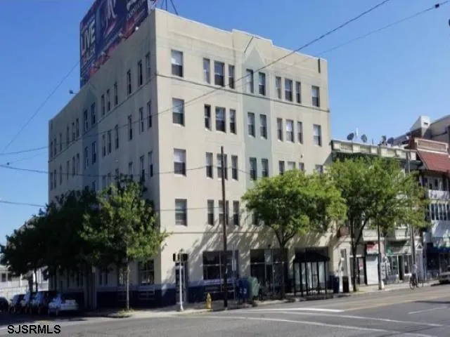 a view of a building with a street