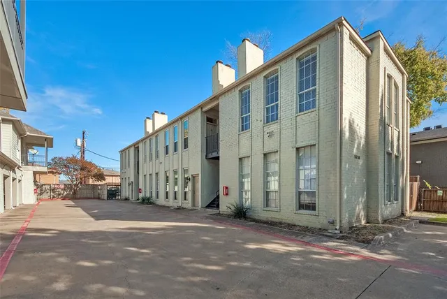 a view of a building with a street