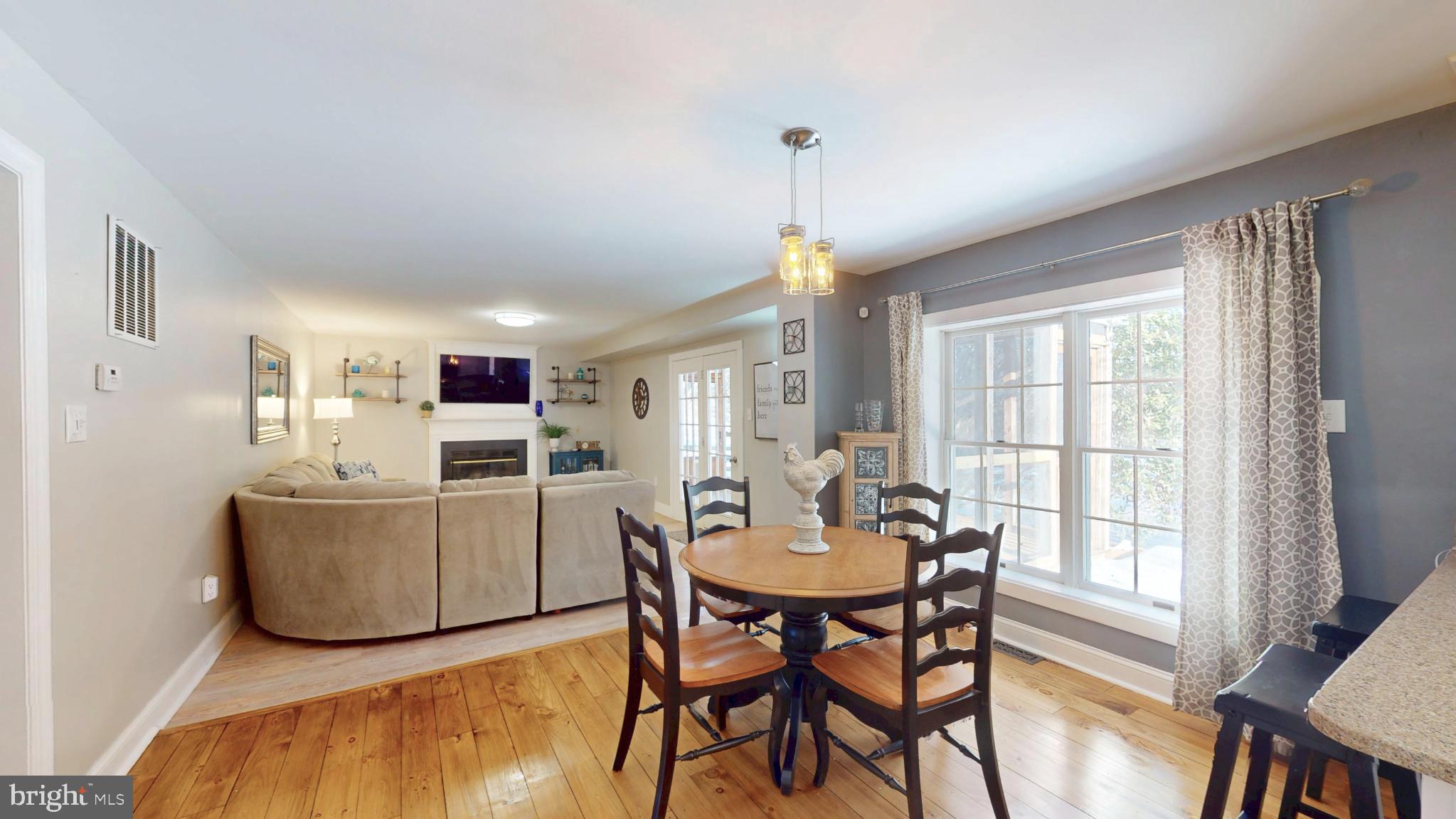 20192 Cockerill Road Purcellville, VA 20132 - Photo 14 of 59 a living room with furniture and a wooden floor
