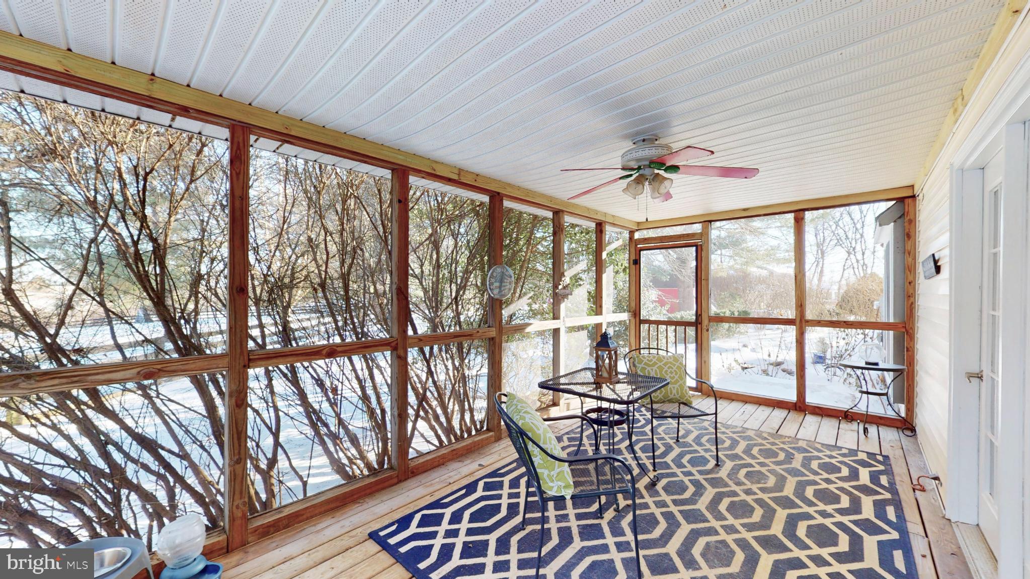 20192 Cockerill Road Purcellville, VA 20132 - Photo 19 of 59 a view of a living room and balcony with furniture