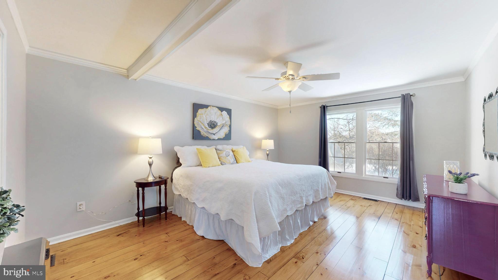 20192 Cockerill Road Purcellville, VA 20132 - Photo 22 of 59 a bedroom with a large bed and a window