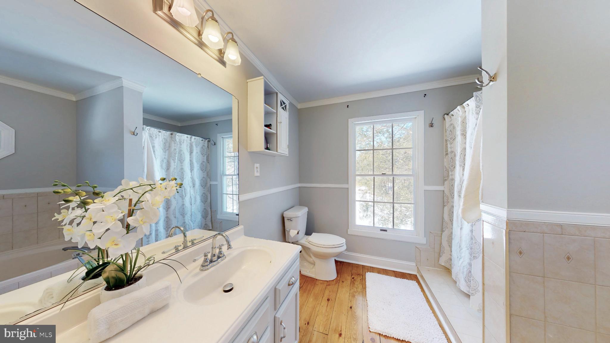 20192 Cockerill Road Purcellville, VA 20132 - Photo 26 of 59 a living room with furniture and a window