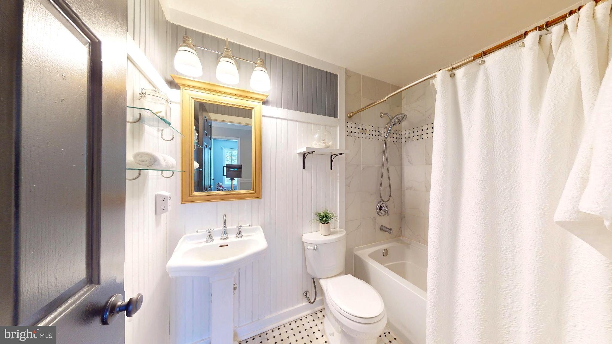 20192 Cockerill Road Purcellville, VA 20132 - Photo 31 of 59 a bathroom with a sink a toilet and shower