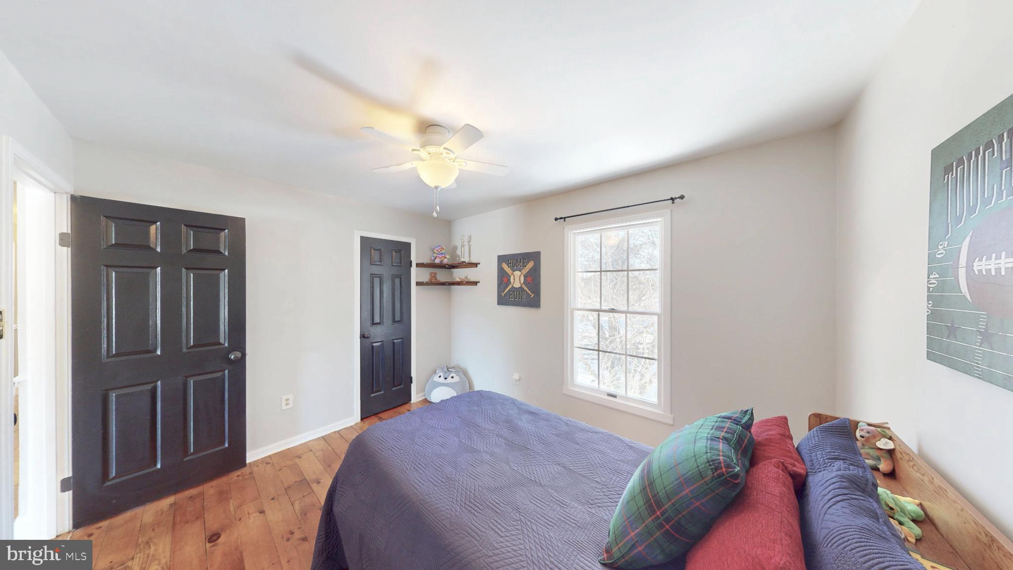 20192 Cockerill Road Purcellville, VA 20132 - Photo 33 of 59 a bedroom with a bed and a window