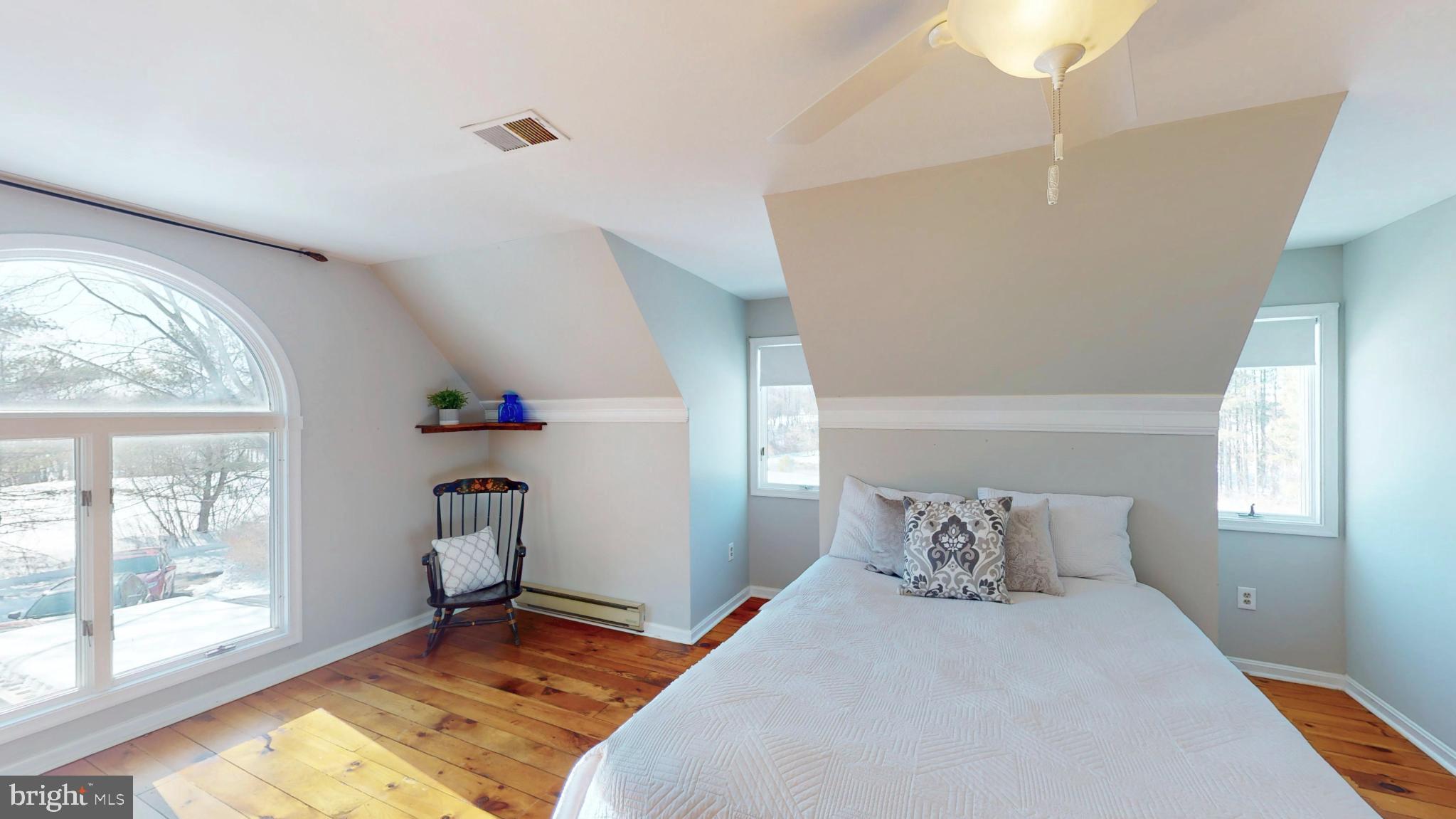 20192 Cockerill Road Purcellville, VA 20132 - Photo 38 of 59 a bedroom with a bed and a window