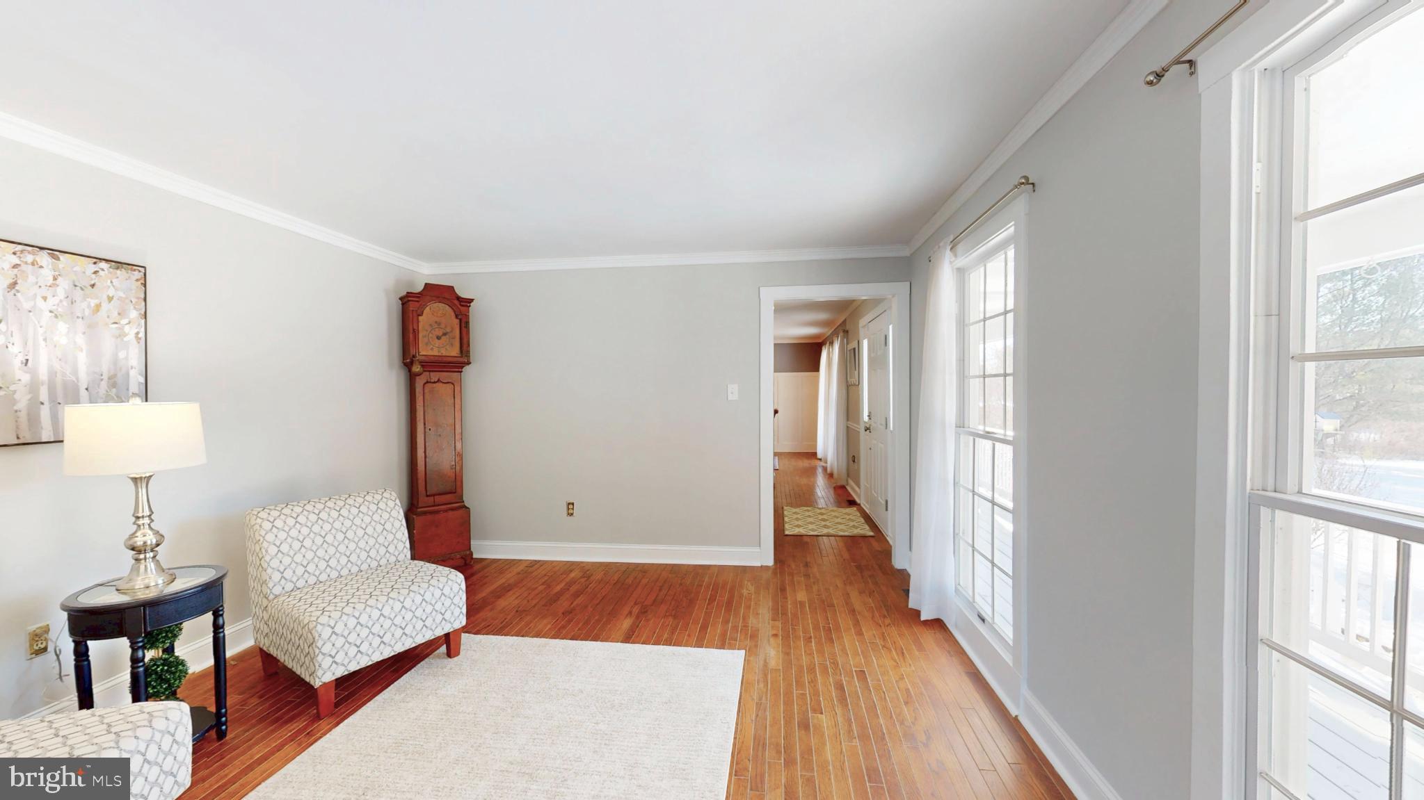 20192 Cockerill Road Purcellville, VA 20132 - Photo 4 of 59 a bedroom with furniture and a wooden floor