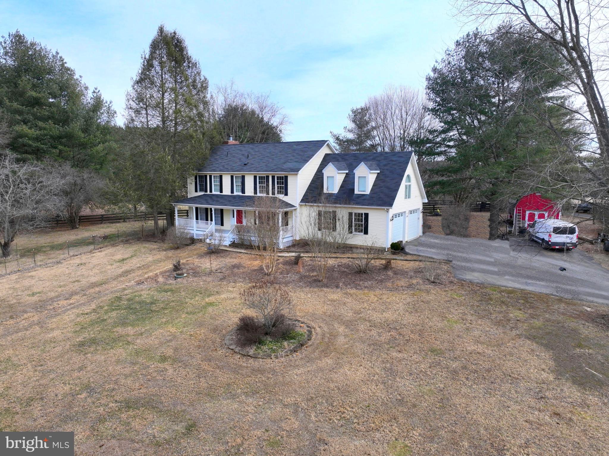 20192 Cockerill Road Purcellville, VA 20132 - Photo 47 of 59 a front view of a house with a yard
